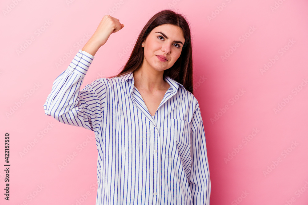 Young caucasian woman isolated on pink background celebrating a victory, passion and enthusiasm, happy expression. Young caucasian woman isolated on pink background celebrating a victory, passion and enthusiasm, happy expression.