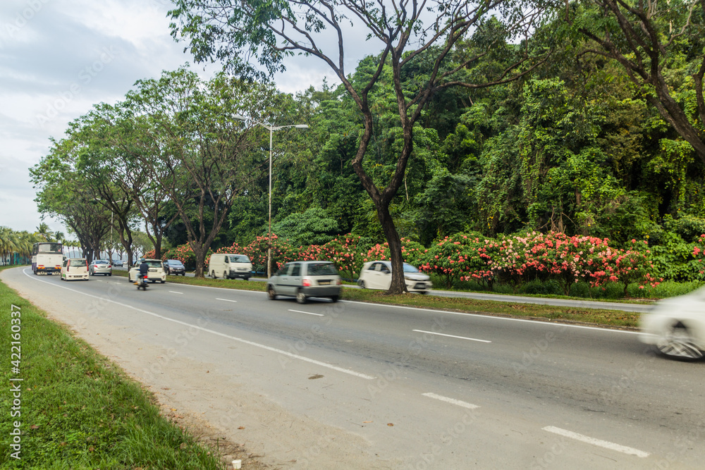 Traffic on Jalan Tun Fuad Stephen road in Kota Kinabalu, Sabah, Malaysia