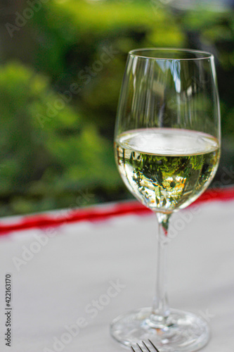 white wine in a glass cup