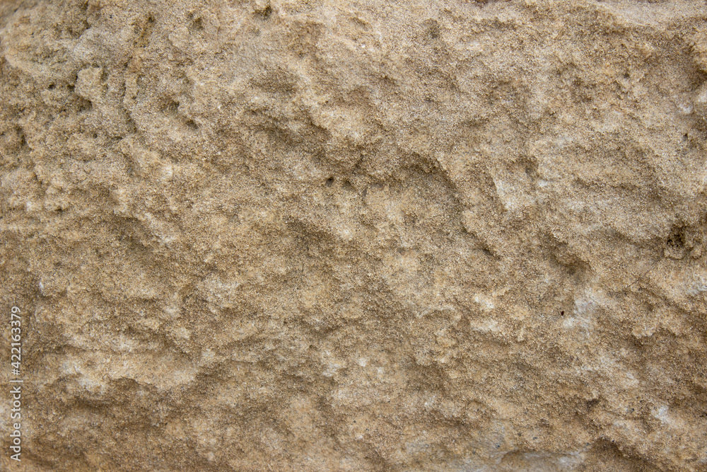 texture of yellow rough stone. Abstract background from yellow stone wall texture of yellow rough stone. Abstract background from yellow stone wall