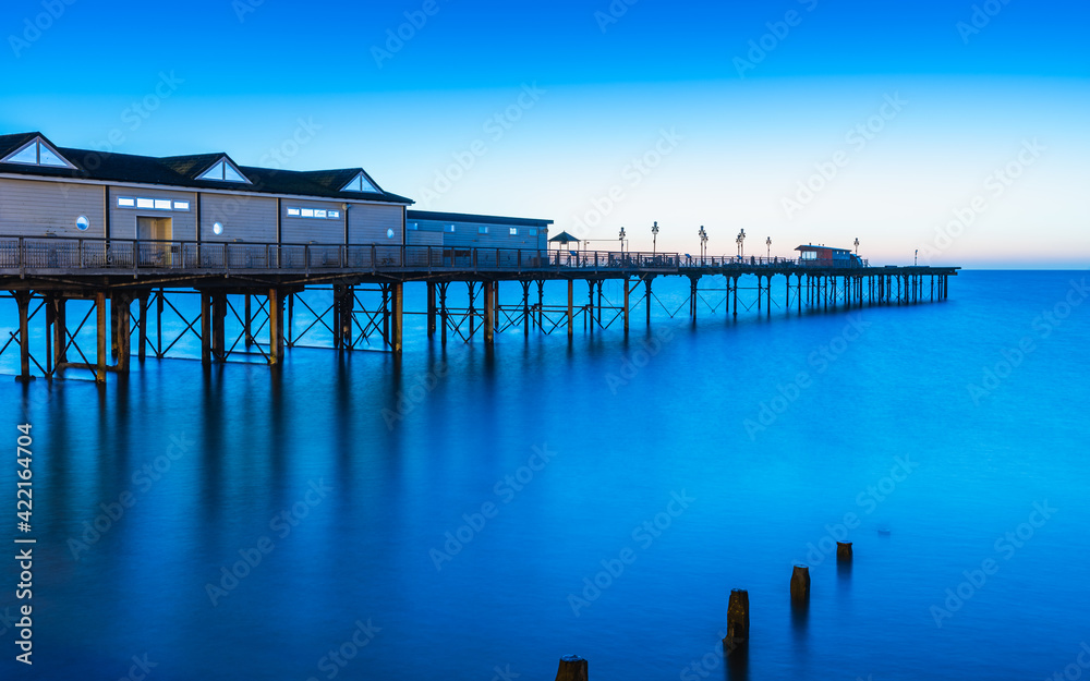 Blue Hour in long time exposure of Grand Pier in Teignmouth, Devon, England, Europe