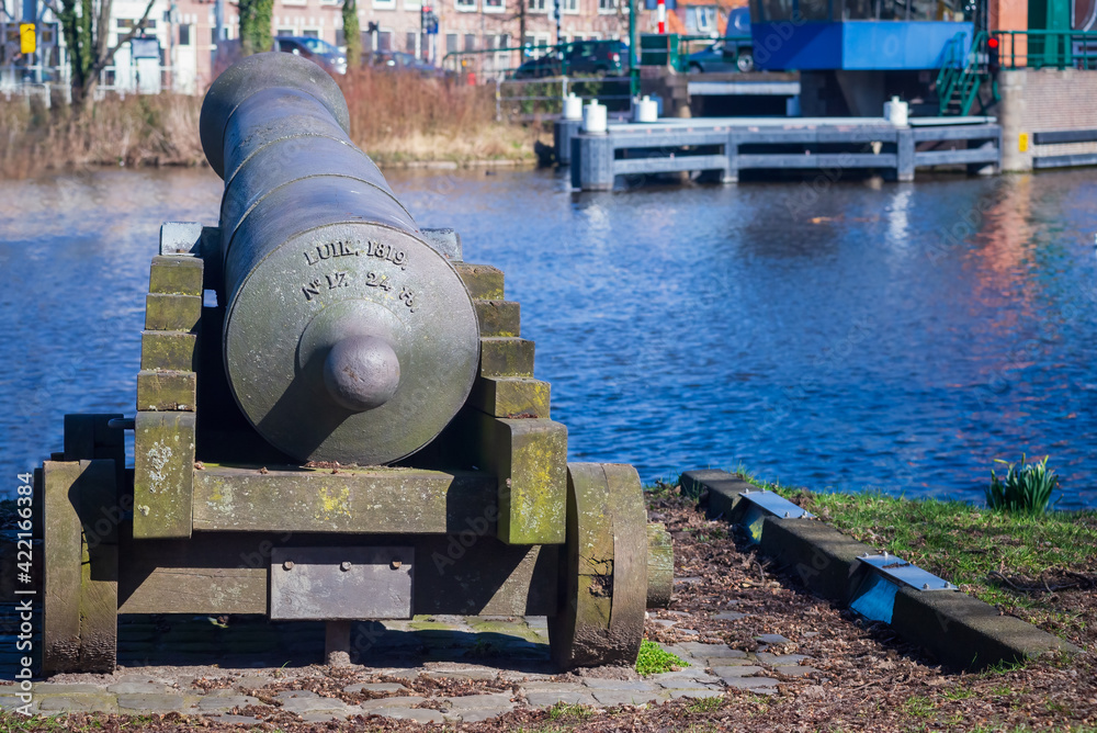 19 March 2021, Leiden, Netherlands, Vintage heavy gun in the Zijlpoort