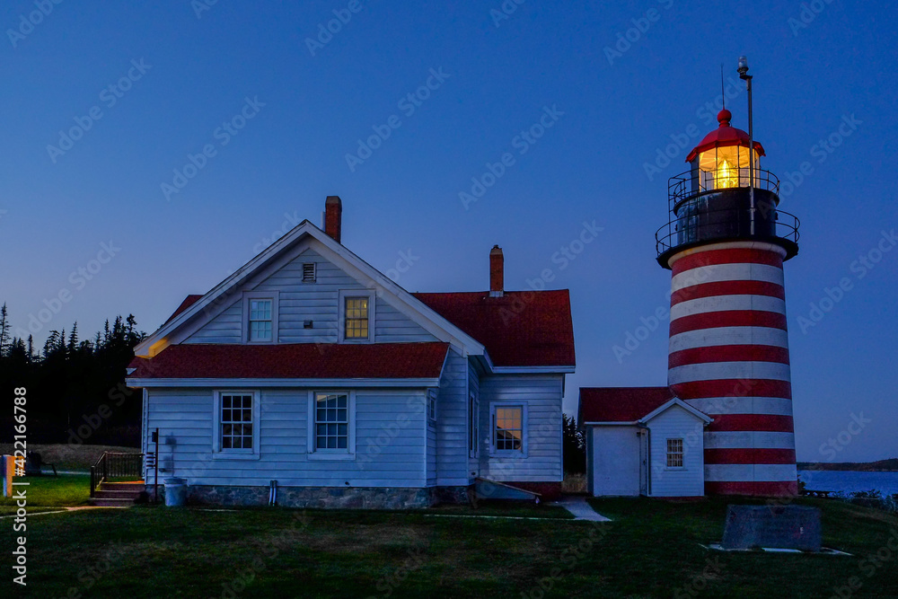 Evening Light and moonrise at the Lubec Lighthouse on the Northern coast of Maine Evening Light and moonrise at the Lubec Lighthouse on the Northern coast of Maine