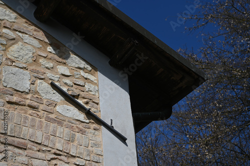 Home retrofit tie rodsused on a country farm house for seismic prevention photo