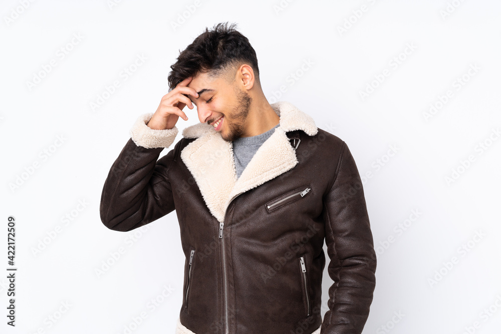 Arabian handsome man over isolated background laughing Arabian handsome man over isolated background laughing