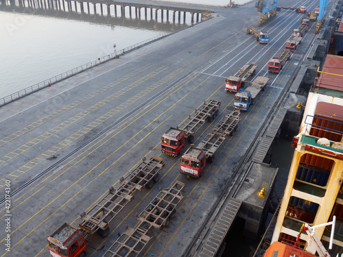 India, Mumbai Port Trust - 25 January, 2017: View to the goods carriers trucks in the port. Port truck.