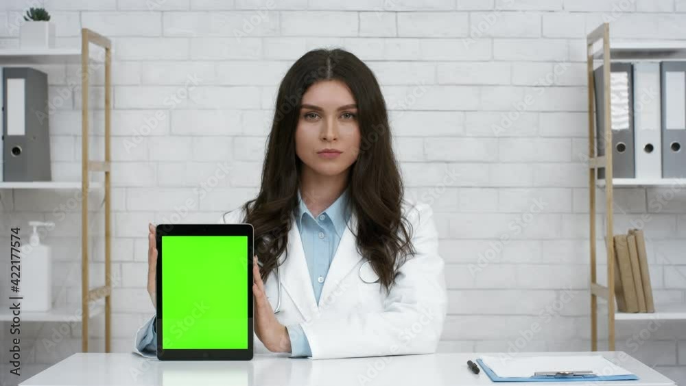 Doctor Woman Showing Digital Tablet With Green Screen In Office Doctor Woman Showing Digital Tablet With Green Screen In Office