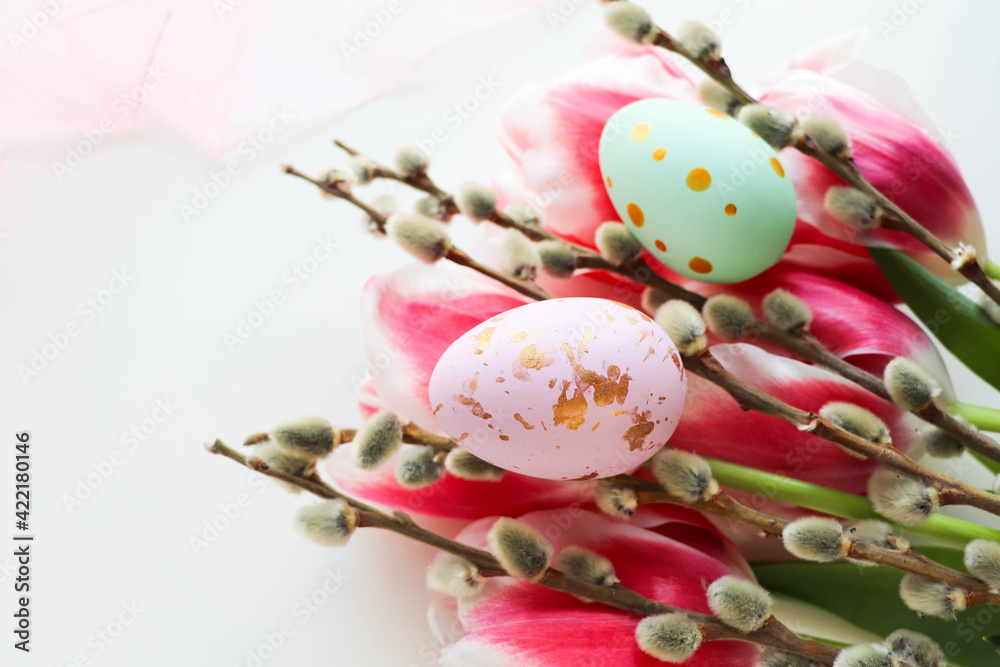 Easter greeting card. Easter eggs, flowers and willow twigs  - obrazy, fototapety, plakaty 