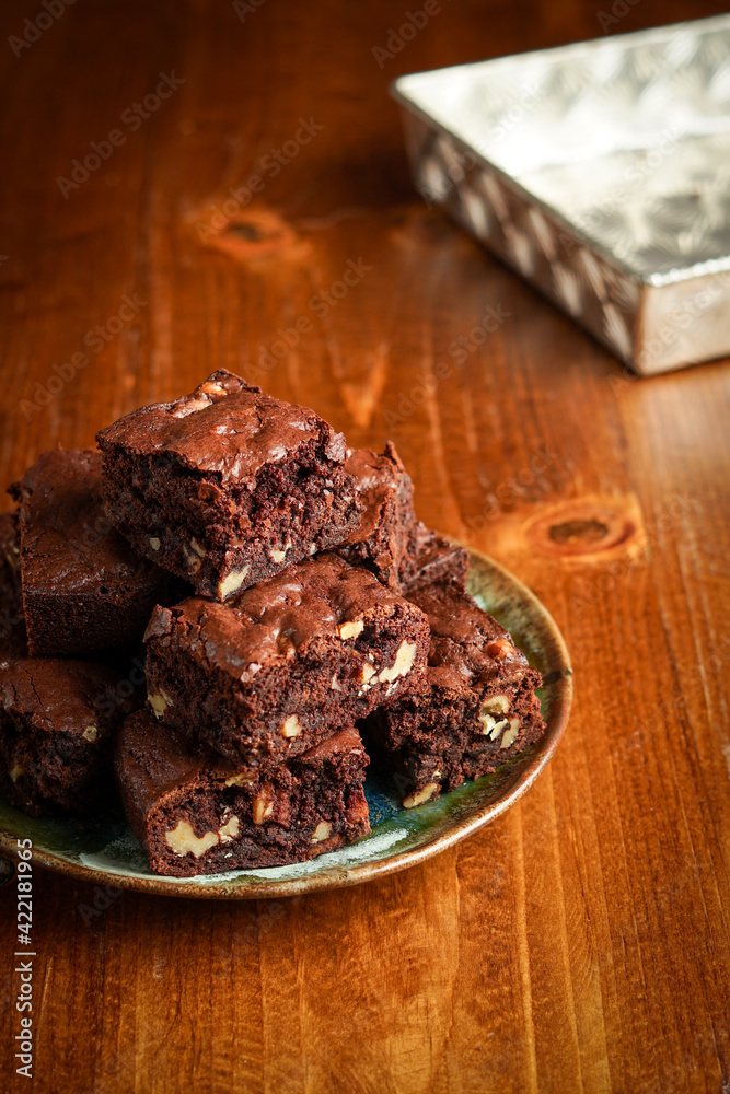 Brownies with walnuts on a plate Brownies with walnuts on a plate