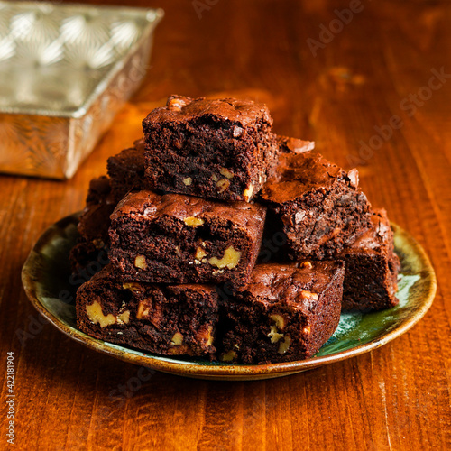 Brownies with walnuts on a plate