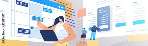 businesswoman planning day scheduling appointment in online calendar app agenda meeting plan time management