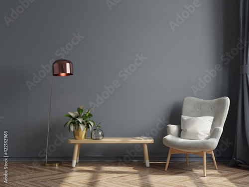 Luxury modern interior of living room has a armchair on empty dark wall background.