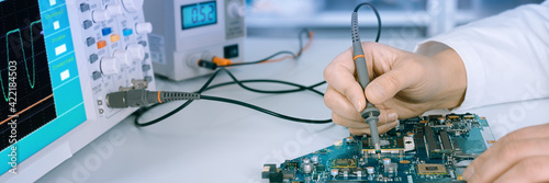 Tech fixes motherboard in service center