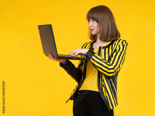 Woman with laptop. Girl pri...