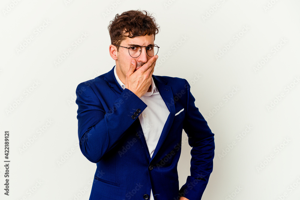 Young business caucasian man isolated on white background covering mouth with hands looking worried. Young business caucasian man isolated on white background covering mouth with hands looking worried.