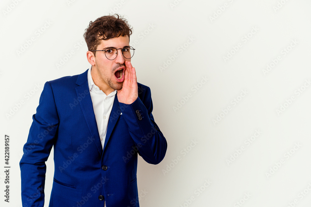 Young business caucasian man isolated on white background being shocked because of something she has seen.