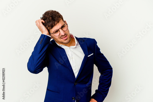 Young business caucasian man isolated on white background celebrating a victory, passion and enthusiasm, happy expression.