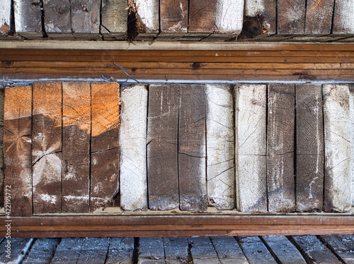 Φωτογραφία Stacked reclaimed lumber