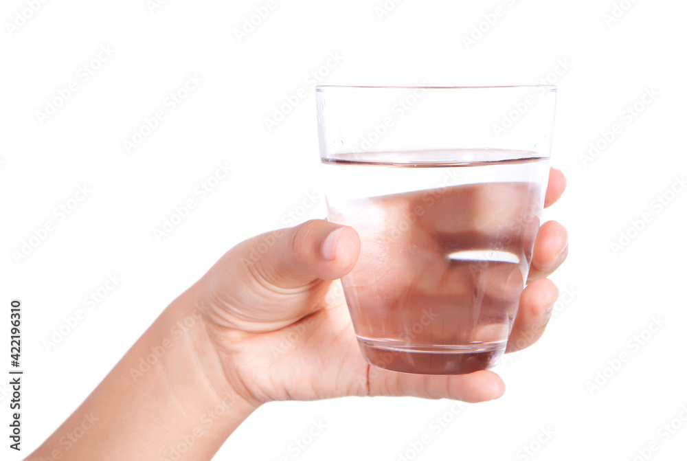 Close up of a glass of white water in hand Close up of a glass of white water in hand