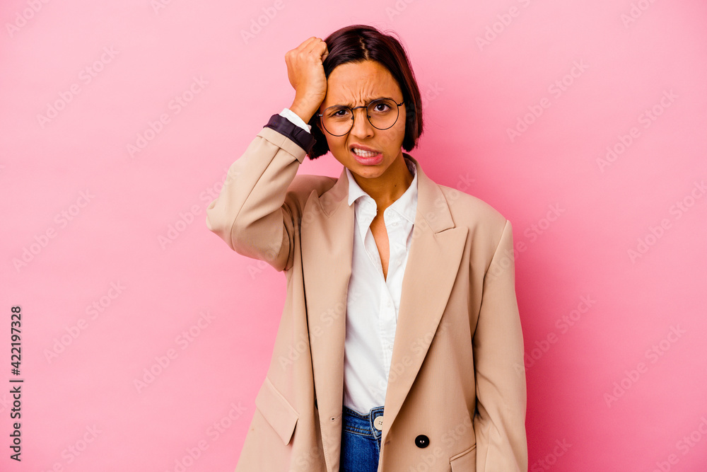Young business mixed race woman isolated on pink background forgetting something, slapping forehead with palm and closing eyes. Young business mixed race woman isolated on pink background forgetting something, slapping forehead with palm and closing eyes.