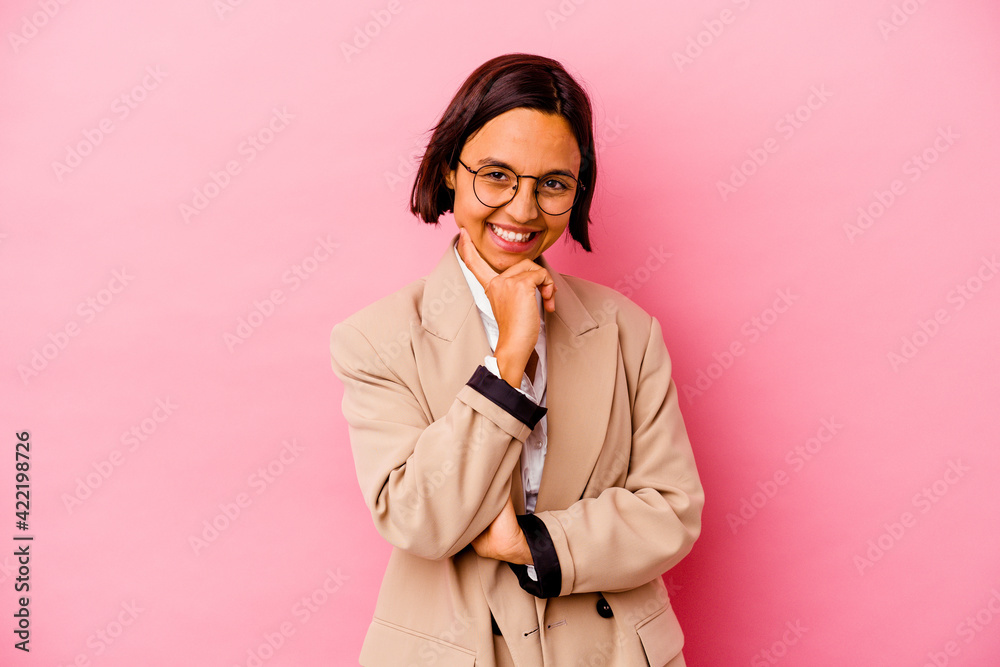 Young business mixed race woman isolated on pink background smiling happy and confident, touching chin with hand. Young business mixed race woman isolated on pink background smiling happy and confident, touching chin with hand.