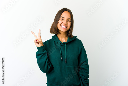 Young mixed race woman showing number two with fingers. © Asier