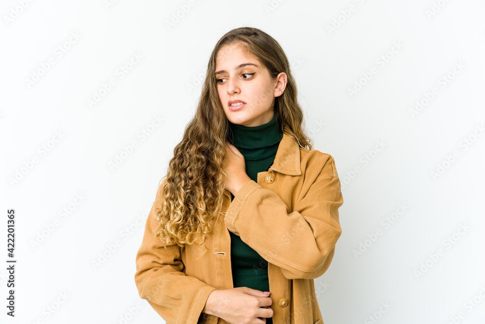 Young caucasian woman having a shoulder pain. Young caucasian woman having a shoulder pain.