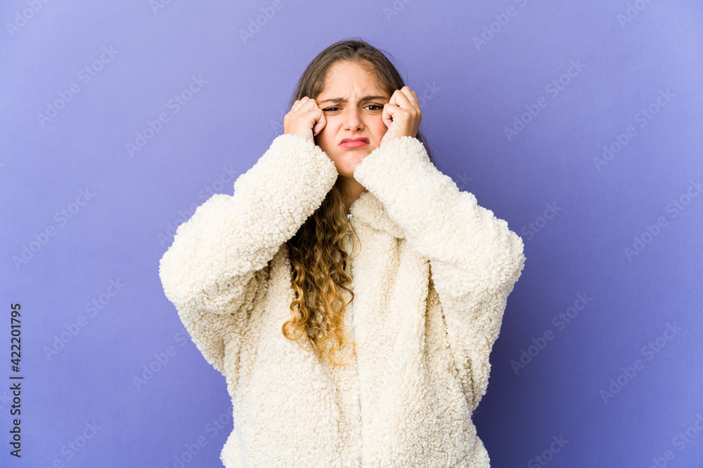 Young caucasian cute woman crying, unhappy with something, agony and confusion concept. Young caucasian cute woman crying, unhappy with something, agony and confusion concept.