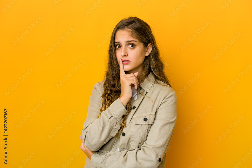 Young caucasian woman unhappy looking in camera with sarcastic expression. Young caucasian woman unhappy looking in camera with sarcastic expression.