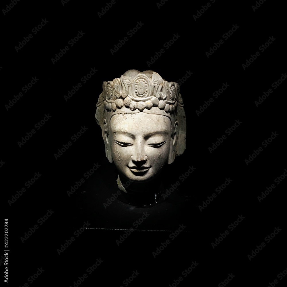Buddha head in black background Buddha head in black background