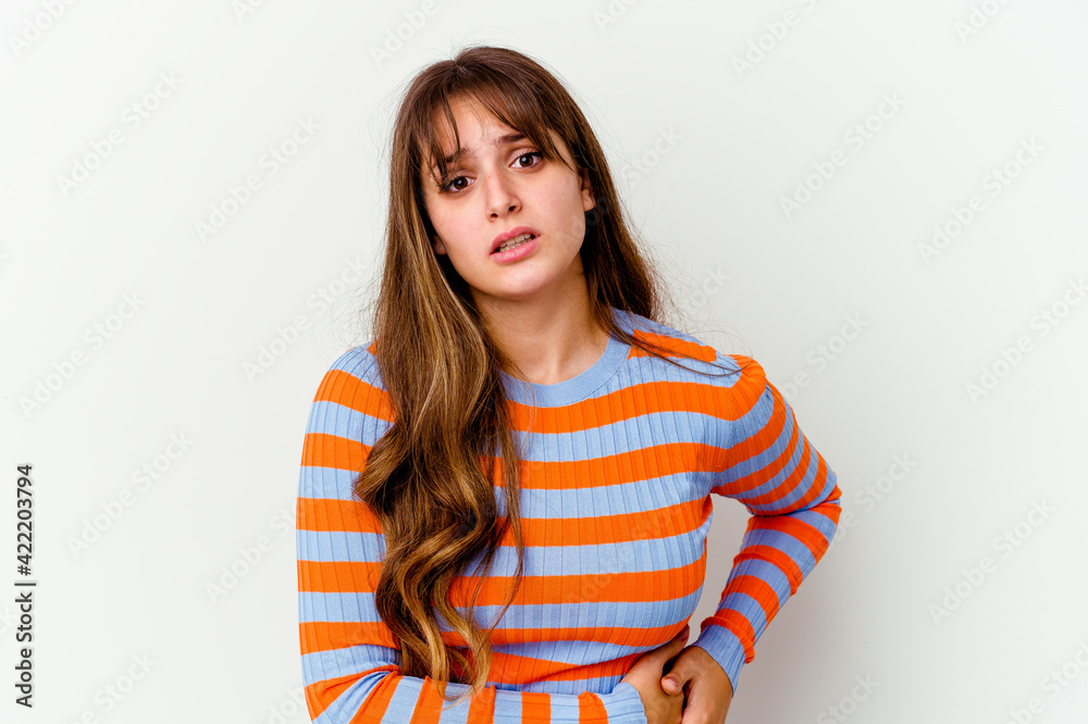 Young caucasian cute woman isolated on white background having a liver pain, stomach ache. Young caucasian cute woman isolated on white background having a liver pain, stomach ache.