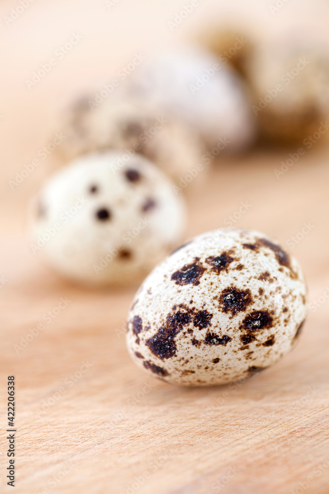 Quail eggs scattered on the cutting board Quail eggs scattered on the cutting board