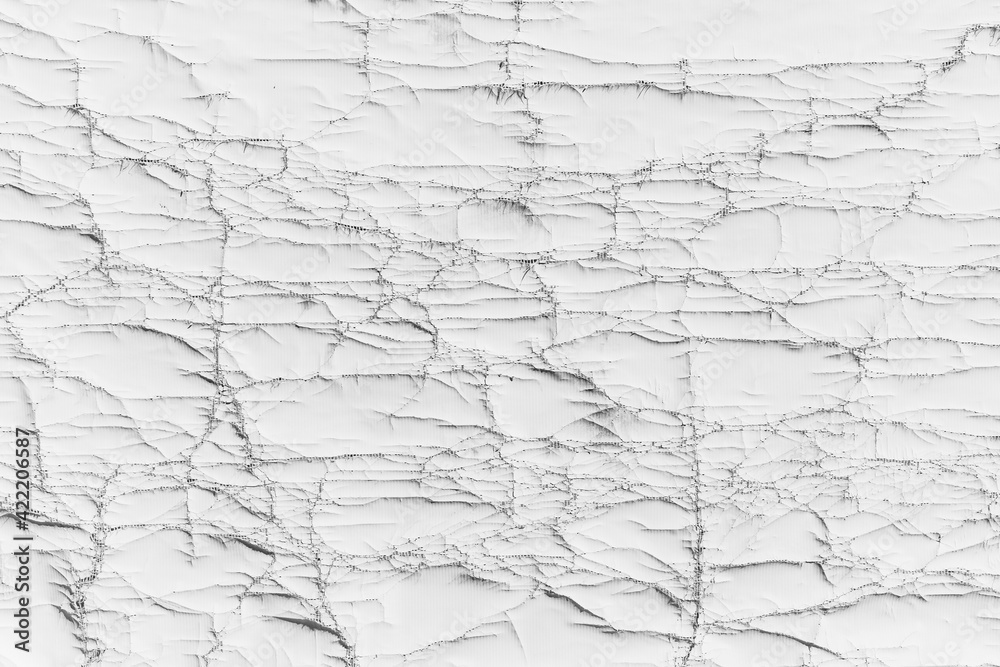 White old surface with many cracks wall damaged texture light background