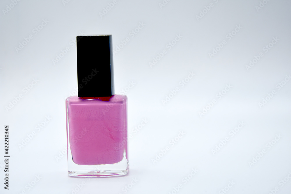 Pink nail polish on white background Pink nail polish on white background