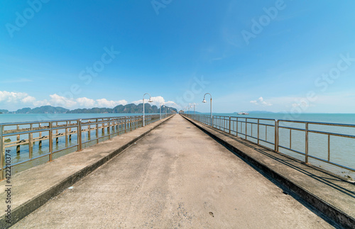 The long bridge in to the sea with beautiful nature view at phang nga Thailand Concept travel background and tour in summer season.travel  website background