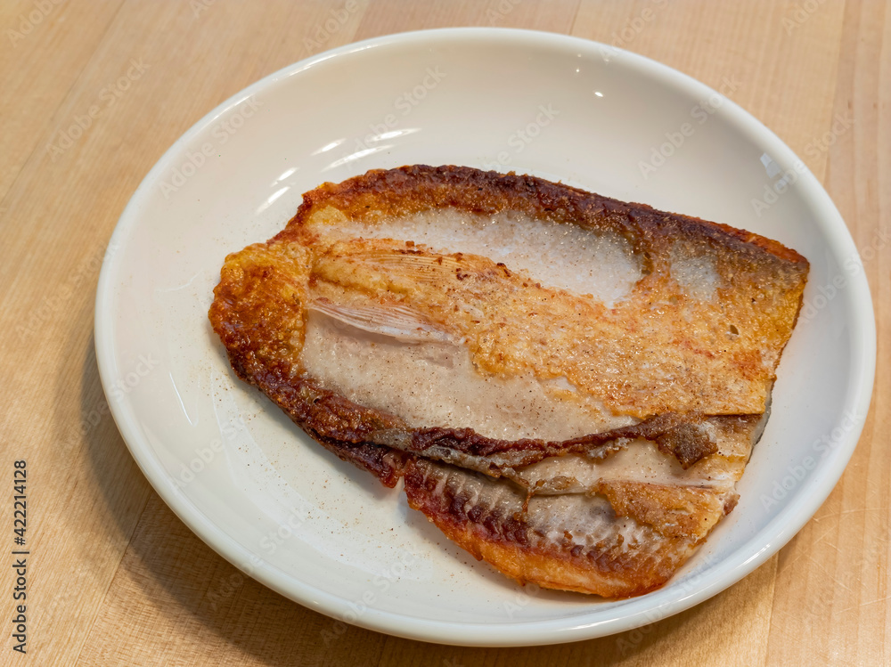 Close up shot of fried Milkfish fillet Close up shot of fried Milkfish fillet