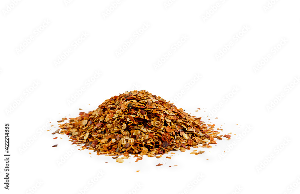 Pile of red pepper flakes isolated on a white background Pile of red pepper flakes isolated on a white background