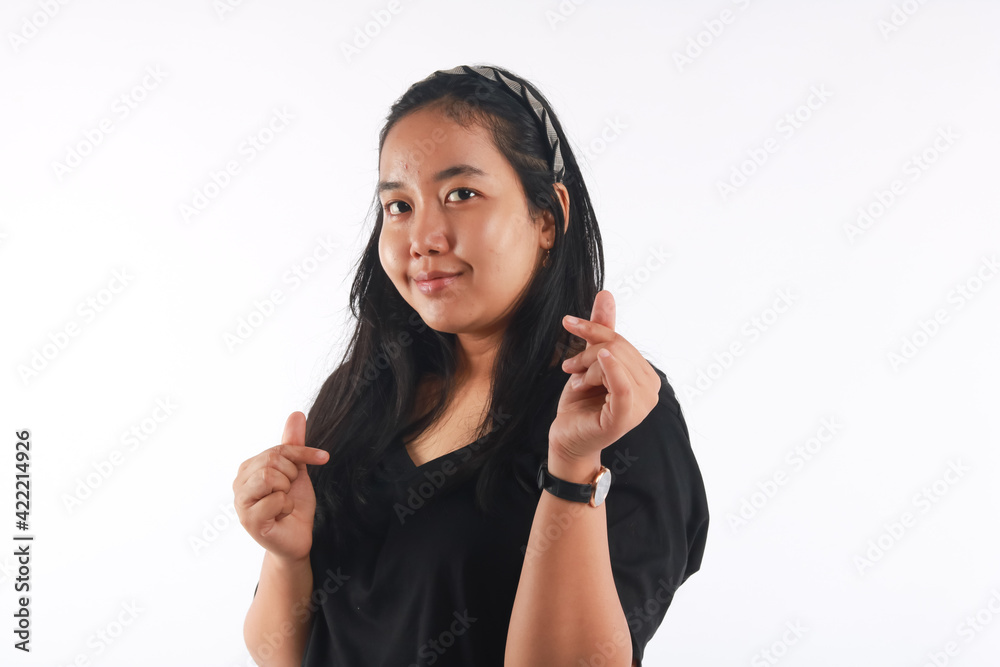 Young Asian woman with no make up on white background. Young Asian woman with no make up on white background.