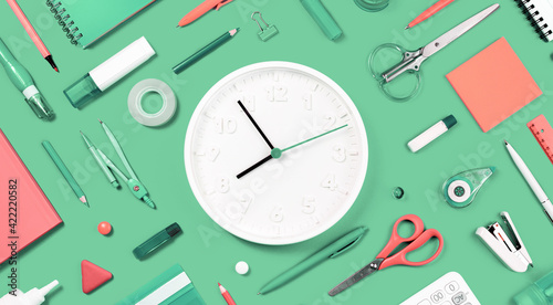 Assorted office and school white orange and green stationery supply on pastel trendy background as knolling. White clock. Flat lay for back to school or education and craft concept. Banner photo