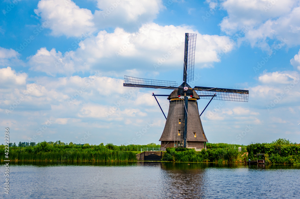 Typical Dutch windmill at the UNESCO world heritage site Kinderdijk village in the Netherlands