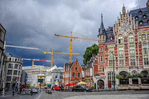 Brussels, Belgium - July 13, 2019: Typical old buildings and construction cranes in downtown Brussels, Belgium