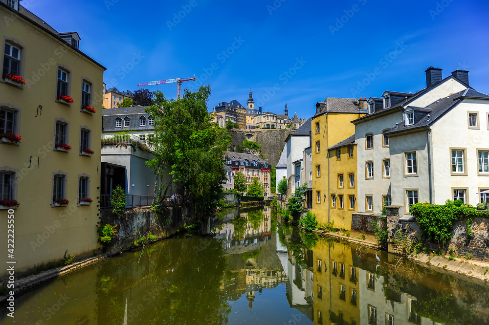 Luxembourg city, Luxembourg - July 16, 2019: Cozy old riverside houses in the old town of Luxembourg city in Luxembourg
