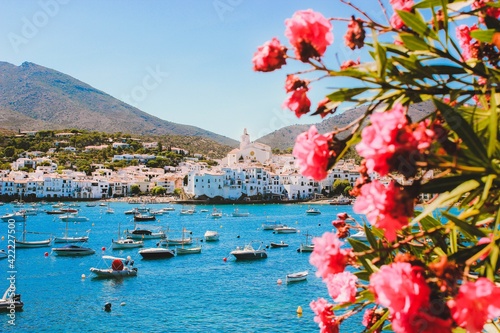 Mediterranean coast. White houses, turquose sea and yachts. Cadaqués village on the Mediterranean seaside, Spain.