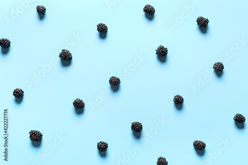 Fresh ripe blackberry on color background