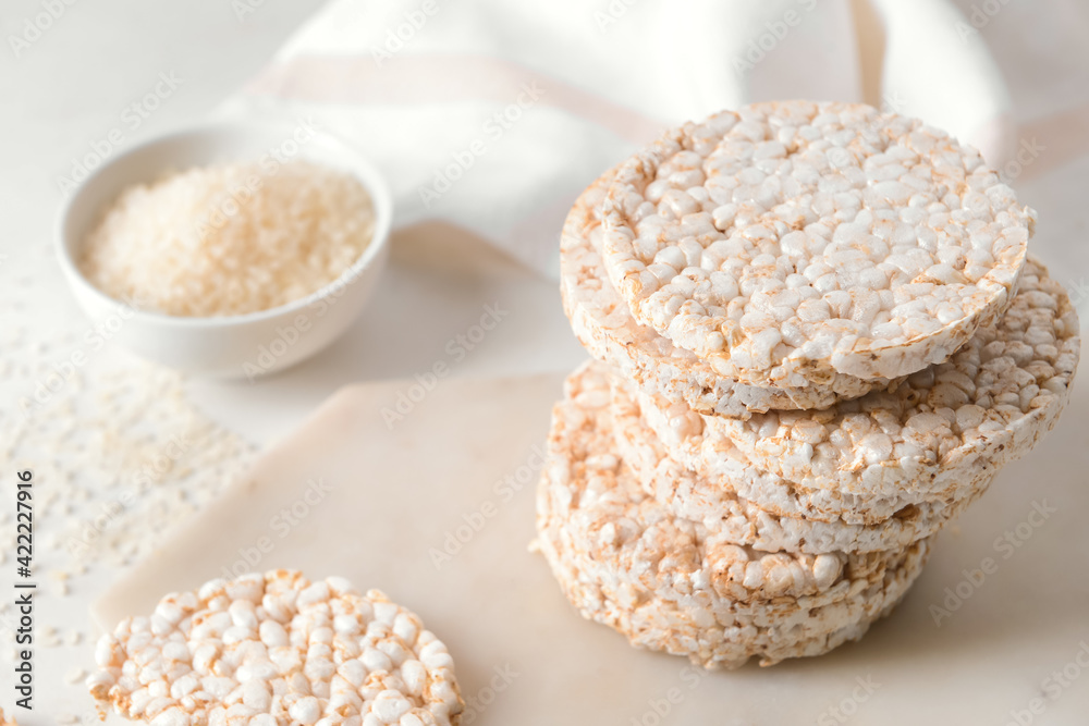 Stack of rice crackers on light background Stack of rice crackers on light background