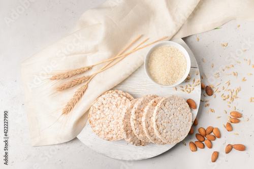 Composition with rice crackers on light background