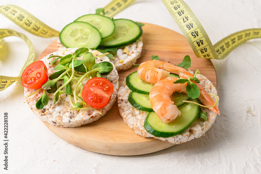 Composition with rice crackers on light background Composition with rice crackers on light background