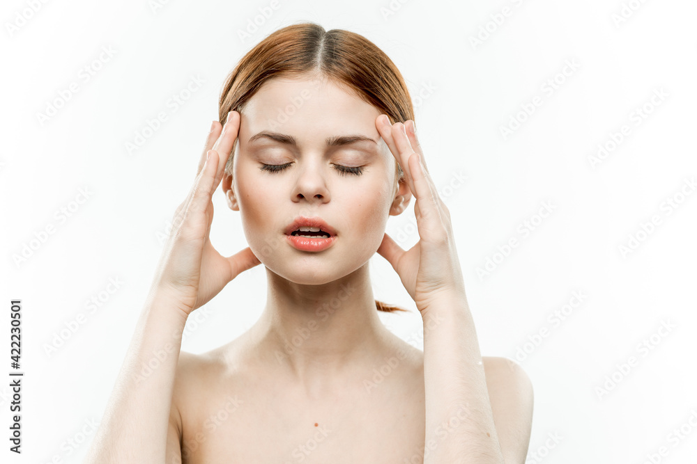 emotional woman holding hands on face naked shoulders charm emotional woman holding hands on face naked shoulders charm
