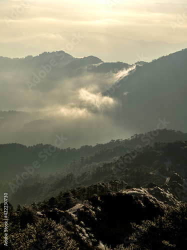 a beautiful panorama of mountain valley with amazing sunrays