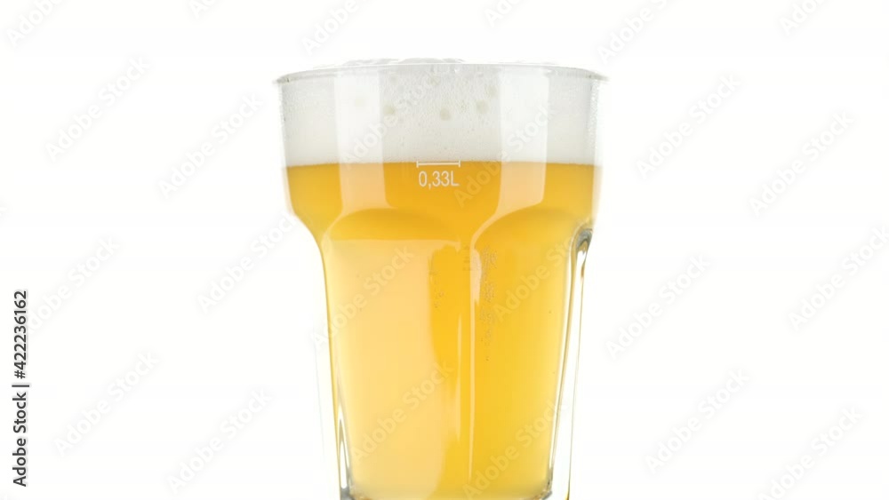 beer. glass of beer with foam isolated on white background, rotate beer. glass of beer with foam isolated on white background, rotate